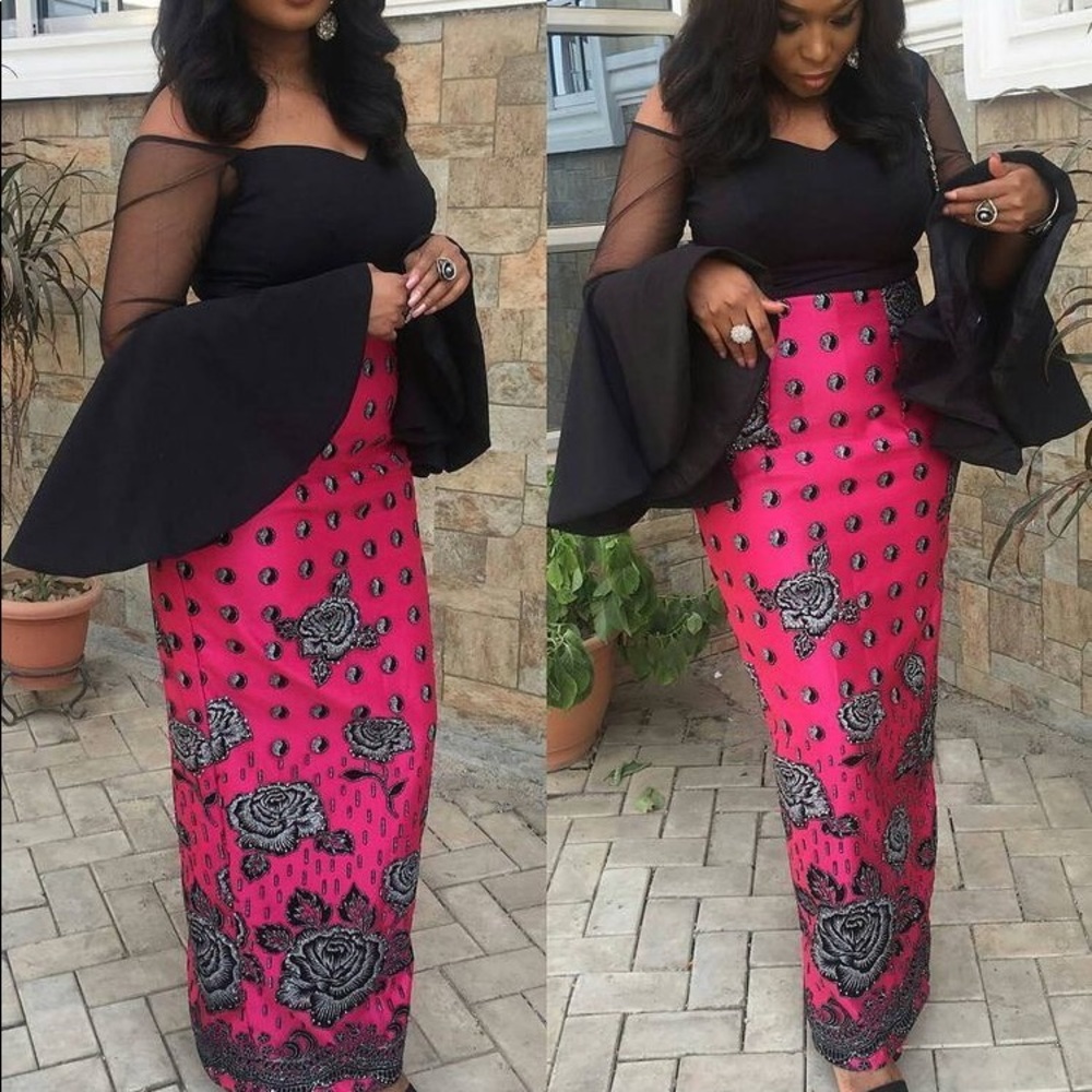 Long straight dress with a flared long sleeve